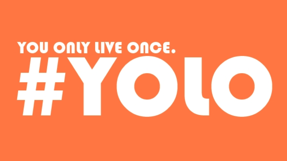 Text "You only live once. #YOLO" written over an orange background
