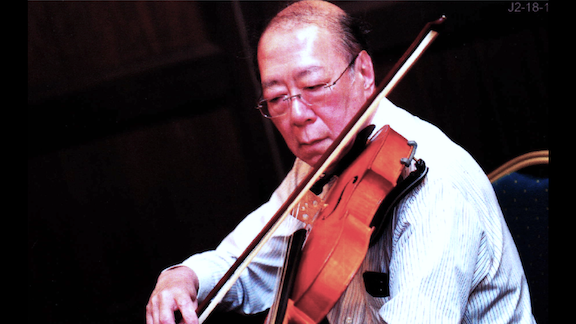 Andrew Ng's father Ronald Ng playing the violin
