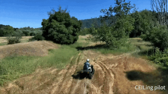Drone following a person riding an ATV