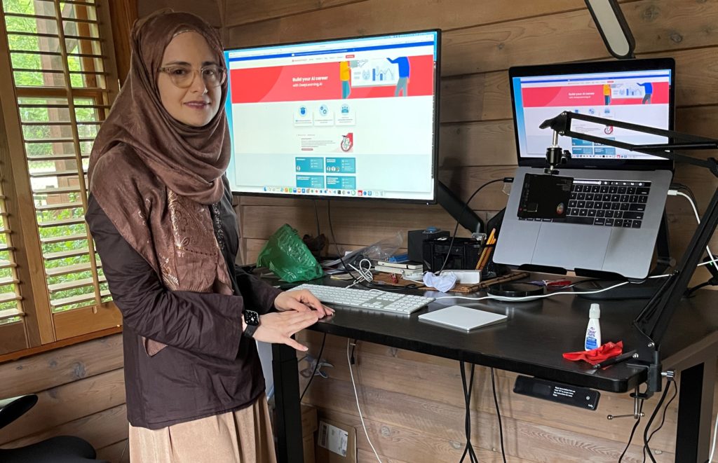 Kulsoom Abdullah, senior data scientist with Anthem, Inc., shows off her home work station. 